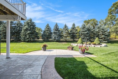 Welcome to this stunning 4-bedroom, 4-bathroom home situated on on Boulder Creek Golf Club in Michigan - for sale on GolfHomes.com, golf home, golf lot