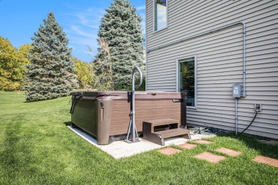 Welcome to this stunning 4-bedroom, 4-bathroom home situated on on Boulder Creek Golf Club in Michigan - for sale on GolfHomes.com, golf home, golf lot