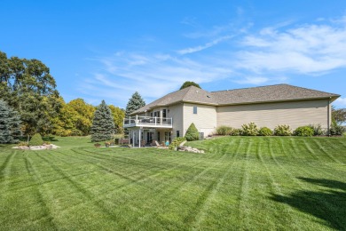 Welcome to this stunning 4-bedroom, 4-bathroom home situated on on Boulder Creek Golf Club in Michigan - for sale on GolfHomes.com, golf home, golf lot