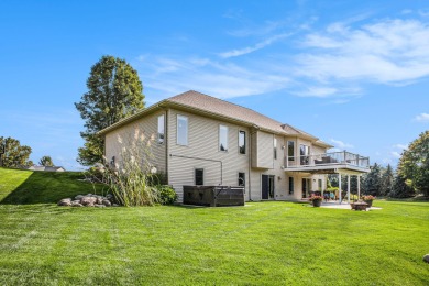 Welcome to this stunning 4-bedroom, 4-bathroom home situated on on Boulder Creek Golf Club in Michigan - for sale on GolfHomes.com, golf home, golf lot