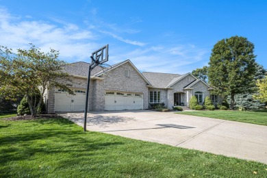Welcome to this stunning 4-bedroom, 4-bathroom home situated on on Boulder Creek Golf Club in Michigan - for sale on GolfHomes.com, golf home, golf lot