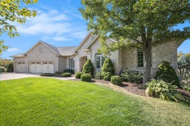 Welcome to this stunning 4-bedroom, 4-bathroom home situated on on Boulder Creek Golf Club in Michigan - for sale on GolfHomes.com, golf home, golf lot
