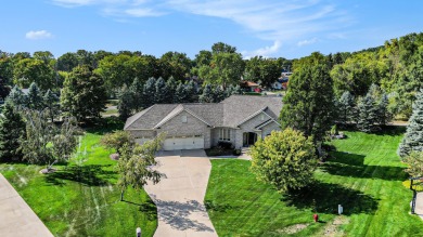 Welcome to this stunning 4-bedroom, 4-bathroom home situated on on Boulder Creek Golf Club in Michigan - for sale on GolfHomes.com, golf home, golf lot