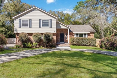 Located in the sought-after Country Club Estates, this 4-bedroom on DeLand Country Club in Florida - for sale on GolfHomes.com, golf home, golf lot