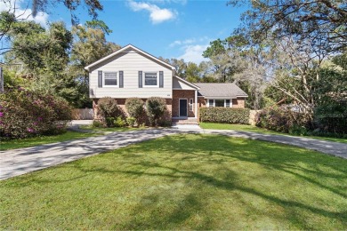 Located in the sought-after Country Club Estates, this 4-bedroom on DeLand Country Club in Florida - for sale on GolfHomes.com, golf home, golf lot