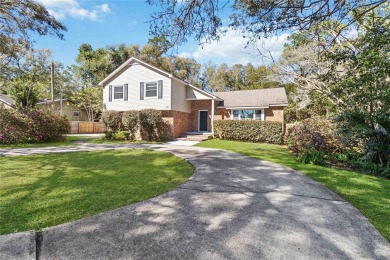 Located in the sought-after Country Club Estates, this 4-bedroom on DeLand Country Club in Florida - for sale on GolfHomes.com, golf home, golf lot