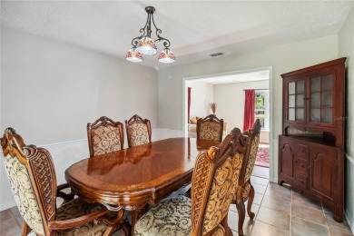 Located in the sought-after Country Club Estates, this 4-bedroom on DeLand Country Club in Florida - for sale on GolfHomes.com, golf home, golf lot