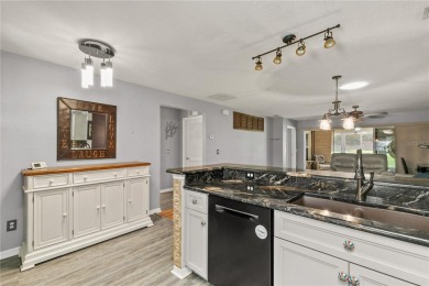 Paradise found!  Adorable and well maintained villa in Arlington on Arlington Ridge Golf Club in Florida - for sale on GolfHomes.com, golf home, golf lot