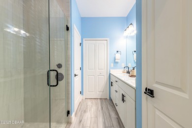 Discover the perfect blend of comfort and charm in this on LPGA International Golf Course in Florida - for sale on GolfHomes.com, golf home, golf lot