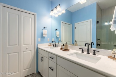 Discover the perfect blend of comfort and charm in this on LPGA International Golf Course in Florida - for sale on GolfHomes.com, golf home, golf lot