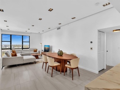Step into unparalleled elegance with this exquisitely remodeled on Turnberry Isle Resort and Club in Florida - for sale on GolfHomes.com, golf home, golf lot