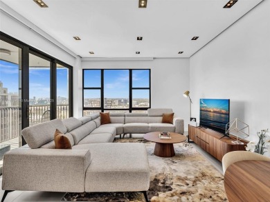 Step into unparalleled elegance with this exquisitely remodeled on Turnberry Isle Resort and Club in Florida - for sale on GolfHomes.com, golf home, golf lot