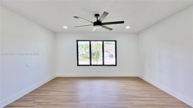 Located in Boca Grove, this charming remodel features a on Boca Grove Golf and Tennis in Florida - for sale on GolfHomes.com, golf home, golf lot