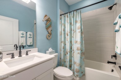 Discover the perfect blend of comfort and charm in this on LPGA International Golf Course in Florida - for sale on GolfHomes.com, golf home, golf lot
