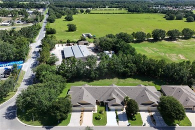 Paradise found!  Adorable and well maintained villa in Arlington on Arlington Ridge Golf Club in Florida - for sale on GolfHomes.com, golf home, golf lot