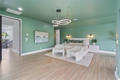 Located in Boca Grove, this charming remodel features a on Boca Grove Golf and Tennis in Florida - for sale on GolfHomes.com, golf home, golf lot