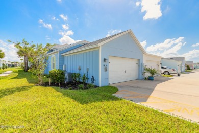 Discover the perfect blend of comfort and charm in this on LPGA International Golf Course in Florida - for sale on GolfHomes.com, golf home, golf lot