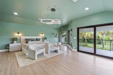 Located in Boca Grove, this charming remodel features a on Boca Grove Golf and Tennis in Florida - for sale on GolfHomes.com, golf home, golf lot