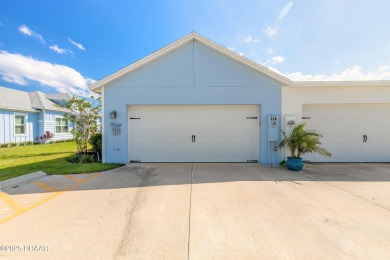 Discover the perfect blend of comfort and charm in this on LPGA International Golf Course in Florida - for sale on GolfHomes.com, golf home, golf lot