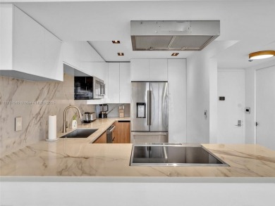 Step into unparalleled elegance with this exquisitely remodeled on Turnberry Isle Resort and Club in Florida - for sale on GolfHomes.com, golf home, golf lot