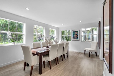 Light-filled and move-in ready, this walled and gated corner-lot on La Gorce Country Club in Florida - for sale on GolfHomes.com, golf home, golf lot