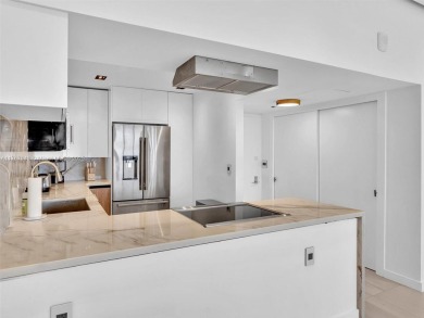 Step into unparalleled elegance with this exquisitely remodeled on Turnberry Isle Resort and Club in Florida - for sale on GolfHomes.com, golf home, golf lot