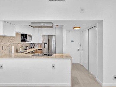 Step into unparalleled elegance with this exquisitely remodeled on Turnberry Isle Resort and Club in Florida - for sale on GolfHomes.com, golf home, golf lot