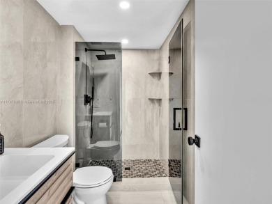 Step into unparalleled elegance with this exquisitely remodeled on Turnberry Isle Resort and Club in Florida - for sale on GolfHomes.com, golf home, golf lot