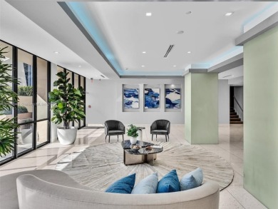 Step into unparalleled elegance with this exquisitely remodeled on Turnberry Isle Resort and Club in Florida - for sale on GolfHomes.com, golf home, golf lot