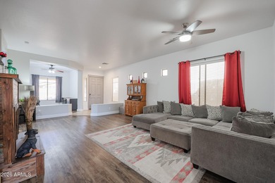 This beautifully maintained 3-bedroom, 2-bath home with a on Estrella Mountain Ranch Golf Course in Arizona - for sale on GolfHomes.com, golf home, golf lot