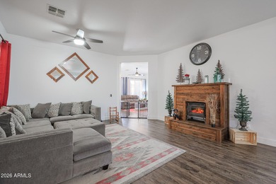 This beautifully maintained 3-bedroom, 2-bath home with a on Estrella Mountain Ranch Golf Course in Arizona - for sale on GolfHomes.com, golf home, golf lot