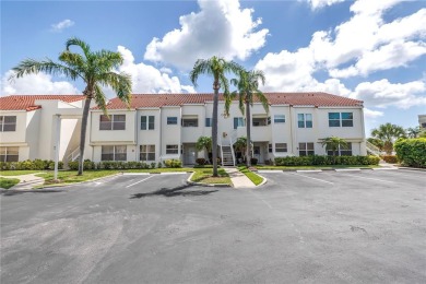 This ground-floor, 2-bedroom, 2-bath condo in Isla Del Sol on Isla Del Sol Yacht and Country Club in Florida - for sale on GolfHomes.com, golf home, golf lot