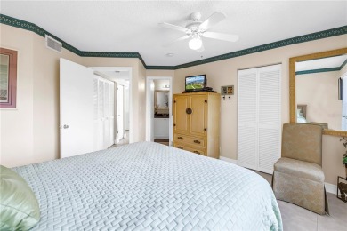 This ground-floor, 2-bedroom, 2-bath condo in Isla Del Sol on Isla Del Sol Yacht and Country Club in Florida - for sale on GolfHomes.com, golf home, golf lot