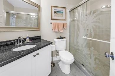 This ground-floor, 2-bedroom, 2-bath condo in Isla Del Sol on Isla Del Sol Yacht and Country Club in Florida - for sale on GolfHomes.com, golf home, golf lot