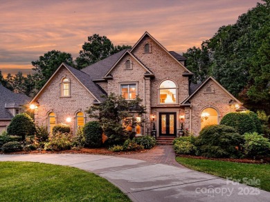 Discover the epitome of luxury living in this stunning executive on Ballantyne Resort and Country Club in North Carolina - for sale on GolfHomes.com, golf home, golf lot