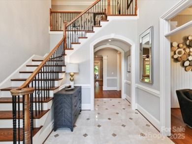 Discover the epitome of luxury living in this stunning executive on Ballantyne Resort and Country Club in North Carolina - for sale on GolfHomes.com, golf home, golf lot