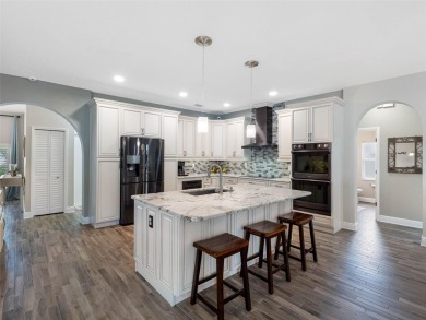 Welcome home to this beautifully UPDATED EXECUTIVE POOL HOME, in on Countryway Golf Course in Florida - for sale on GolfHomes.com, golf home, golf lot