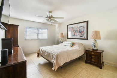 Delightful one level townhouse with step saving kitchen and 2 on Cypress Lakes Golf Course - West Palm Beach in Florida - for sale on GolfHomes.com, golf home, golf lot