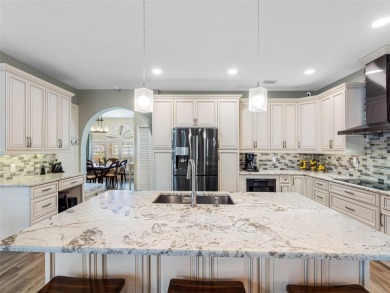 Welcome home to this beautifully UPDATED EXECUTIVE POOL HOME, in on Countryway Golf Course in Florida - for sale on GolfHomes.com, golf home, golf lot