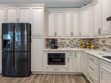Welcome home to this beautifully UPDATED EXECUTIVE POOL HOME, in on Countryway Golf Course in Florida - for sale on GolfHomes.com, golf home, golf lot