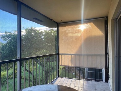 Spacious 2-bedroom, 2-bath condo in a gated community. Both on  in Florida - for sale on GolfHomes.com, golf home, golf lot
