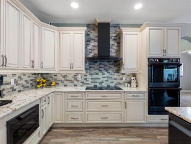 Welcome home to this beautifully UPDATED EXECUTIVE POOL HOME, in on Countryway Golf Course in Florida - for sale on GolfHomes.com, golf home, golf lot
