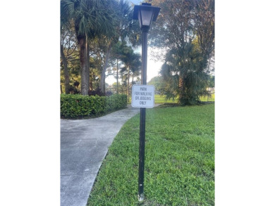 Spacious 2-bedroom, 2-bath condo in a gated community. Both on  in Florida - for sale on GolfHomes.com, golf home, golf lot