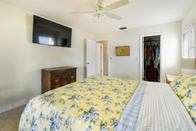 Delightful one level townhouse with step saving kitchen and 2 on Cypress Lakes Golf Course - West Palm Beach in Florida - for sale on GolfHomes.com, golf home, golf lot