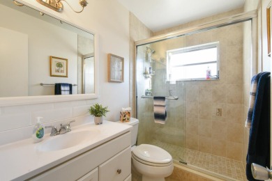 Delightful one level townhouse with step saving kitchen and 2 on Cypress Lakes Golf Course - West Palm Beach in Florida - for sale on GolfHomes.com, golf home, golf lot