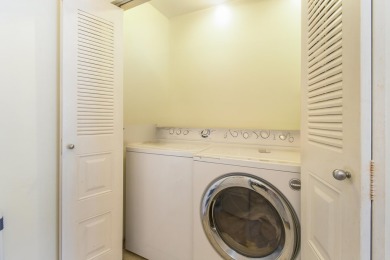 Delightful one level townhouse with step saving kitchen and 2 on Cypress Lakes Golf Course - West Palm Beach in Florida - for sale on GolfHomes.com, golf home, golf lot