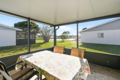 Delightful one level townhouse with step saving kitchen and 2 on Cypress Lakes Golf Course - West Palm Beach in Florida - for sale on GolfHomes.com, golf home, golf lot
