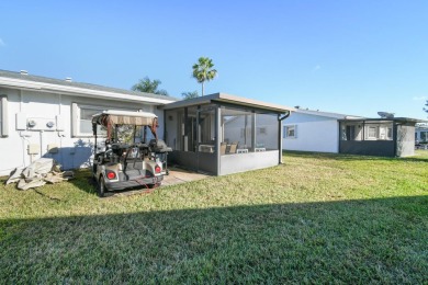 Delightful one level townhouse with step saving kitchen and 2 on Cypress Lakes Golf Course - West Palm Beach in Florida - for sale on GolfHomes.com, golf home, golf lot