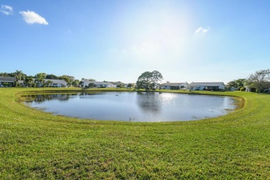 Delightful one level townhouse with step saving kitchen and 2 on Cypress Lakes Golf Course - West Palm Beach in Florida - for sale on GolfHomes.com, golf home, golf lot