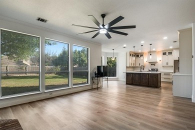 Located in the Woodbridge community in Sachse, this 4-bedroom, 2 on Woodbridge Golf Club in Texas - for sale on GolfHomes.com, golf home, golf lot